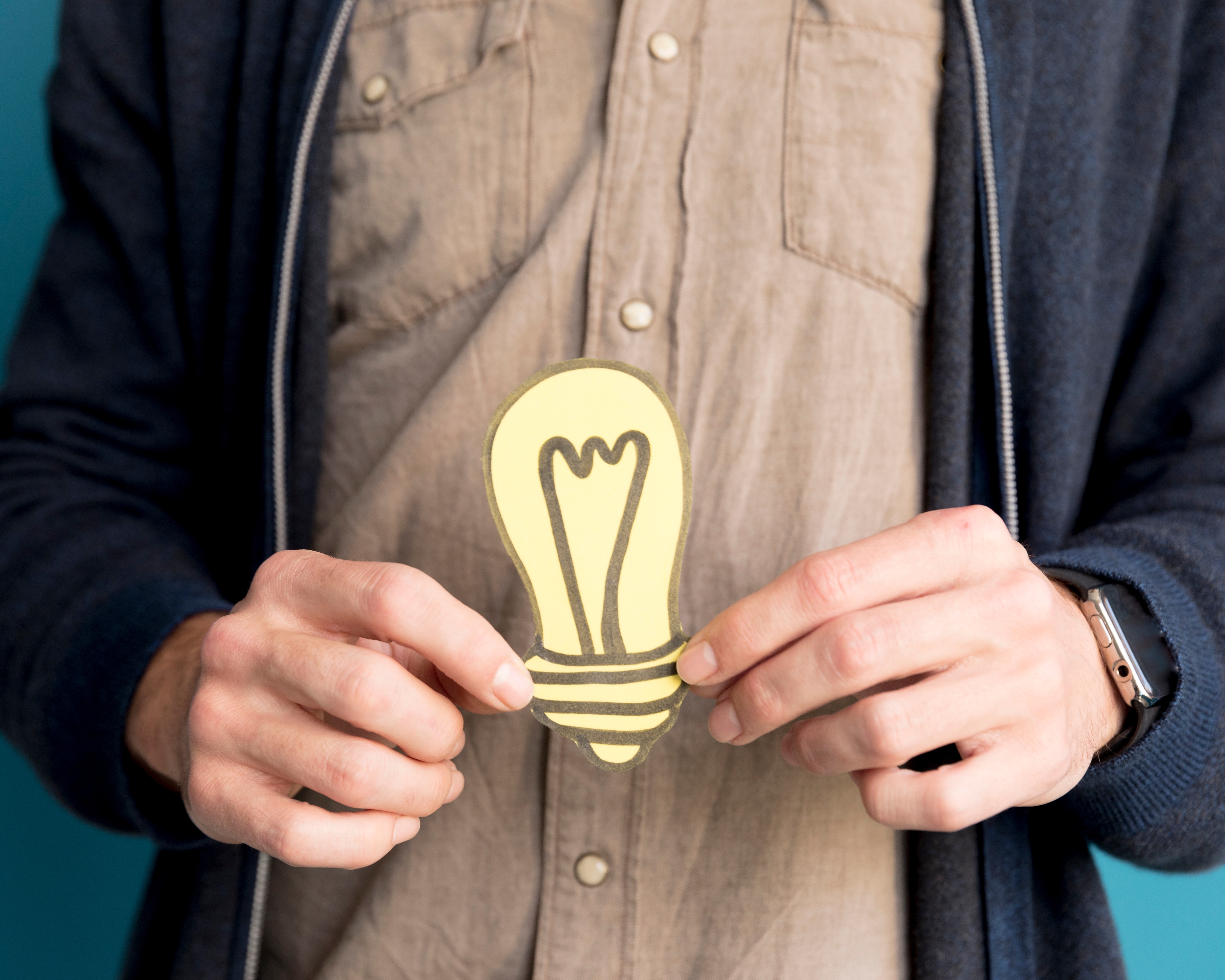 Close up Man Holding Idea Light