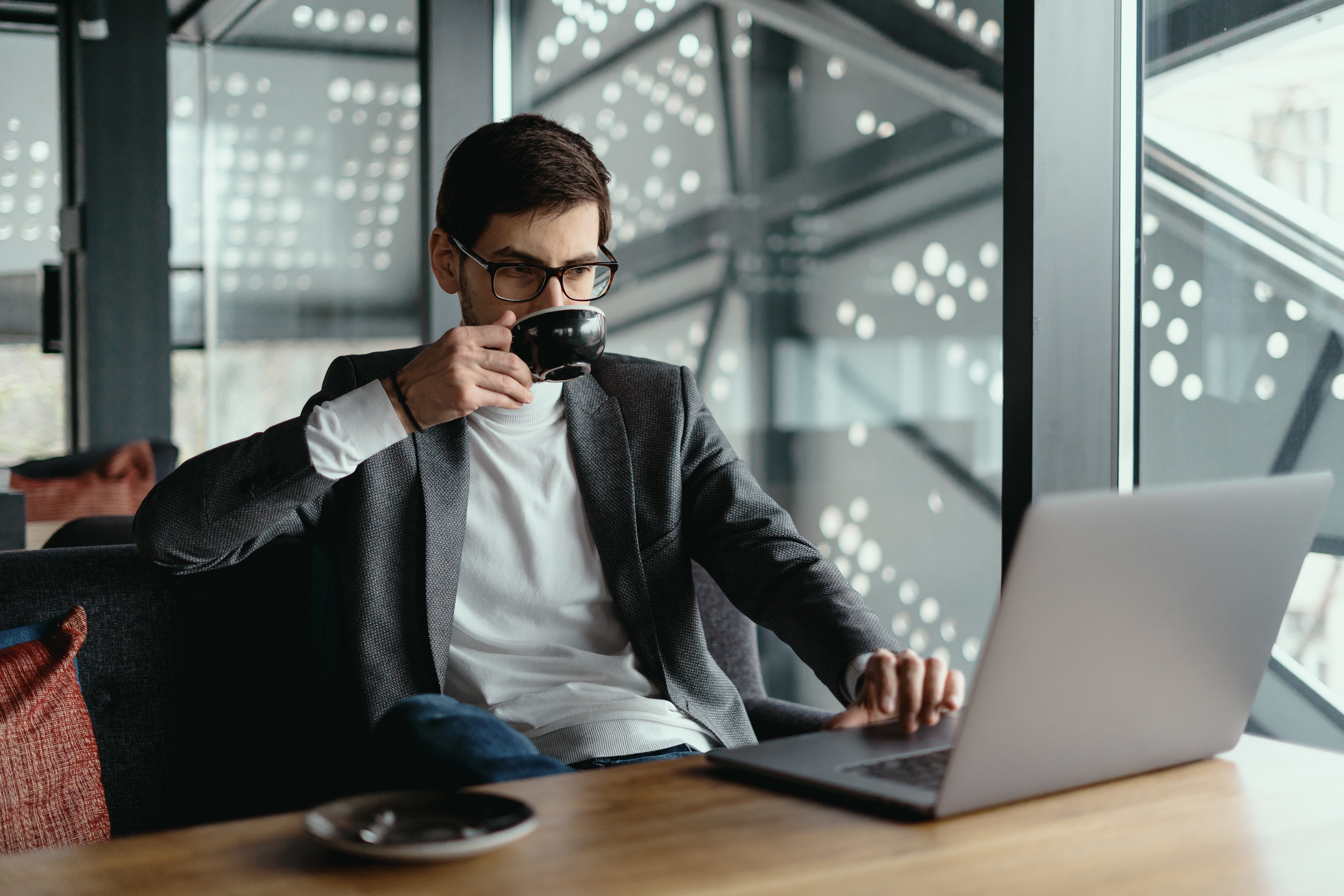 Successful Business Man Working Laptop While Drinking Coffee